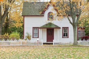 house with autumn leaves