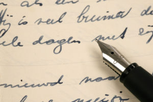 fountain pen and letter