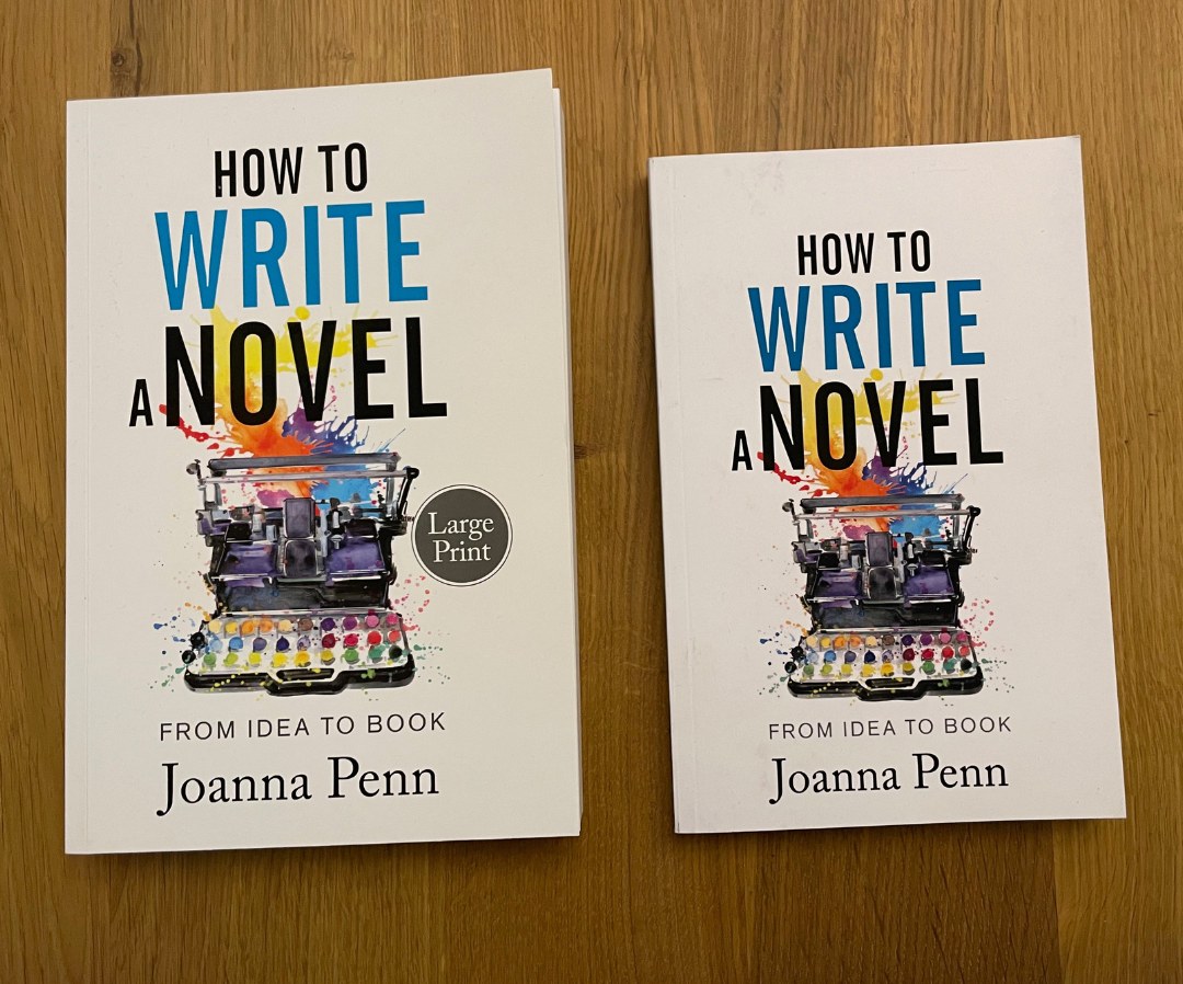 How to Write a Novel large print paperback next to the standard paperback, showing the bigger page size